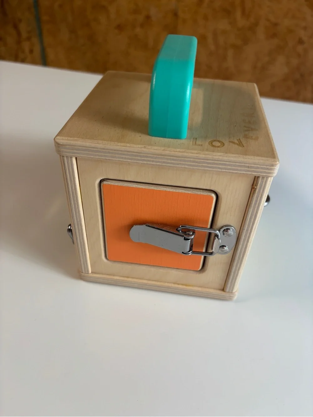Wooden Lock Box Toy with Turquoise Handle and Red Door